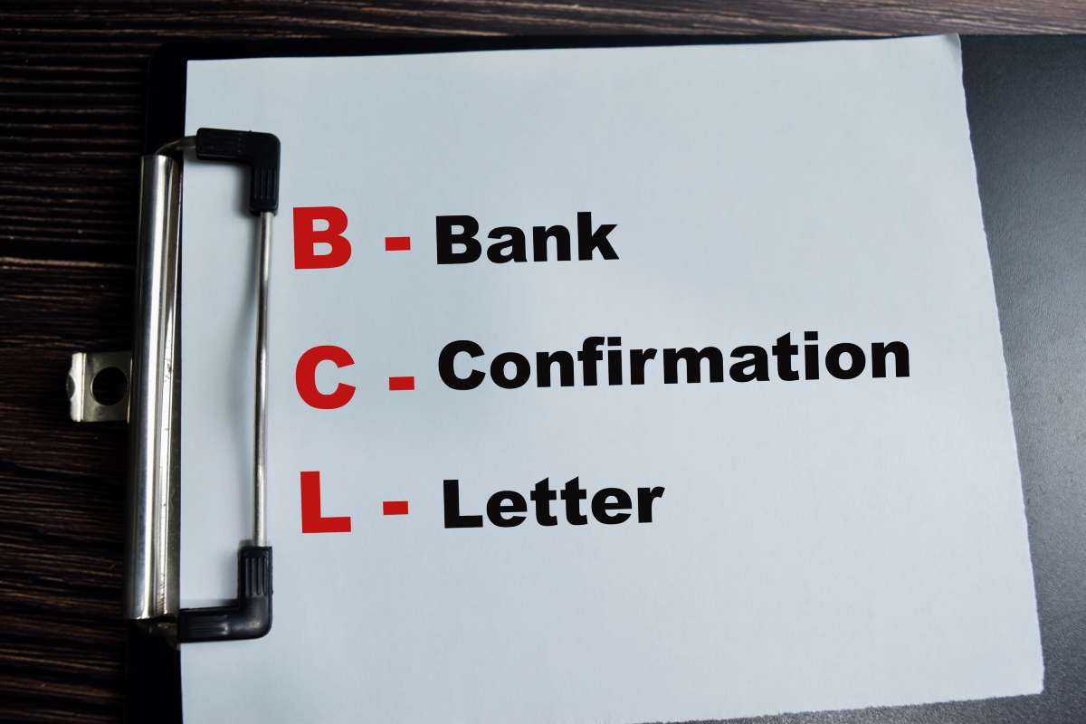 A sheet of paper on a clipboard printed with the letters BCL, explaining the acronym stands for Bank Confirmation Letter.